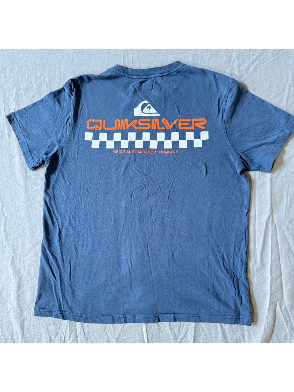 Quiksilver Men's Blue Short Sleeve Graphic T-Shirt with Checkered Logo Design, M